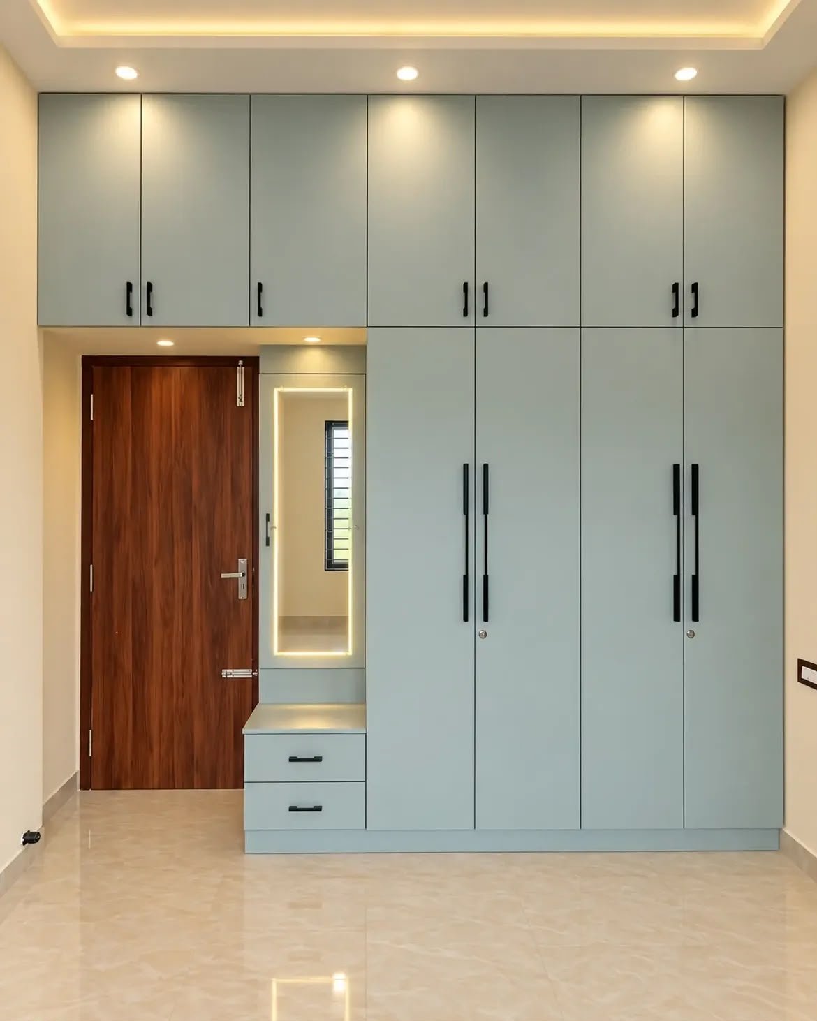 Blue wardrobe with mirror and lighting